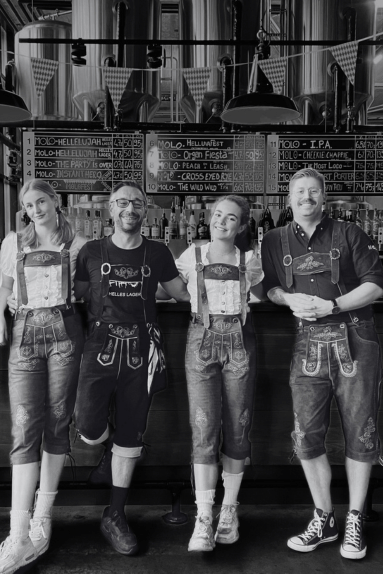 Randy and Molo Crew Octoberfest looking good in dirdl and lederhosen